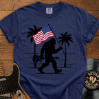Bigfoot American Flag T-Shirt — Patriotic Sasquatch Beach Tee