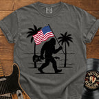 Bigfoot American Flag T-Shirt — Patriotic Sasquatch Beach Tee
